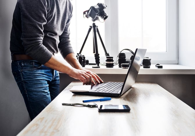 Stock image of person working on laptop