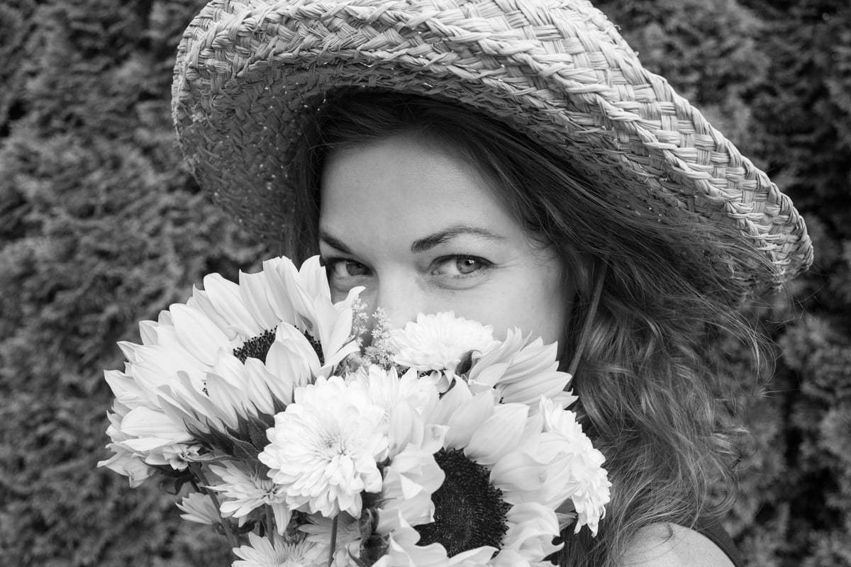 Beautiful woman with sunflowers